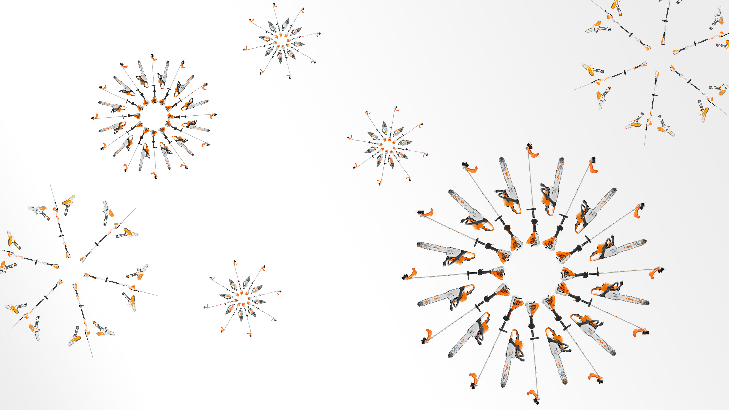 Diverse STIHL Geräte sind zu sehen, die eine Form wie eine Schneeflocke bilden - unter anderem Motorsägen, Freischneider und Gehölzschneider.